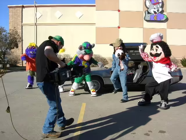 Unused shot of the characters in front of the DeLorean.