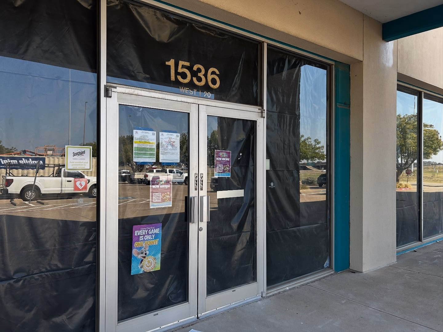 Front door w/ posters.