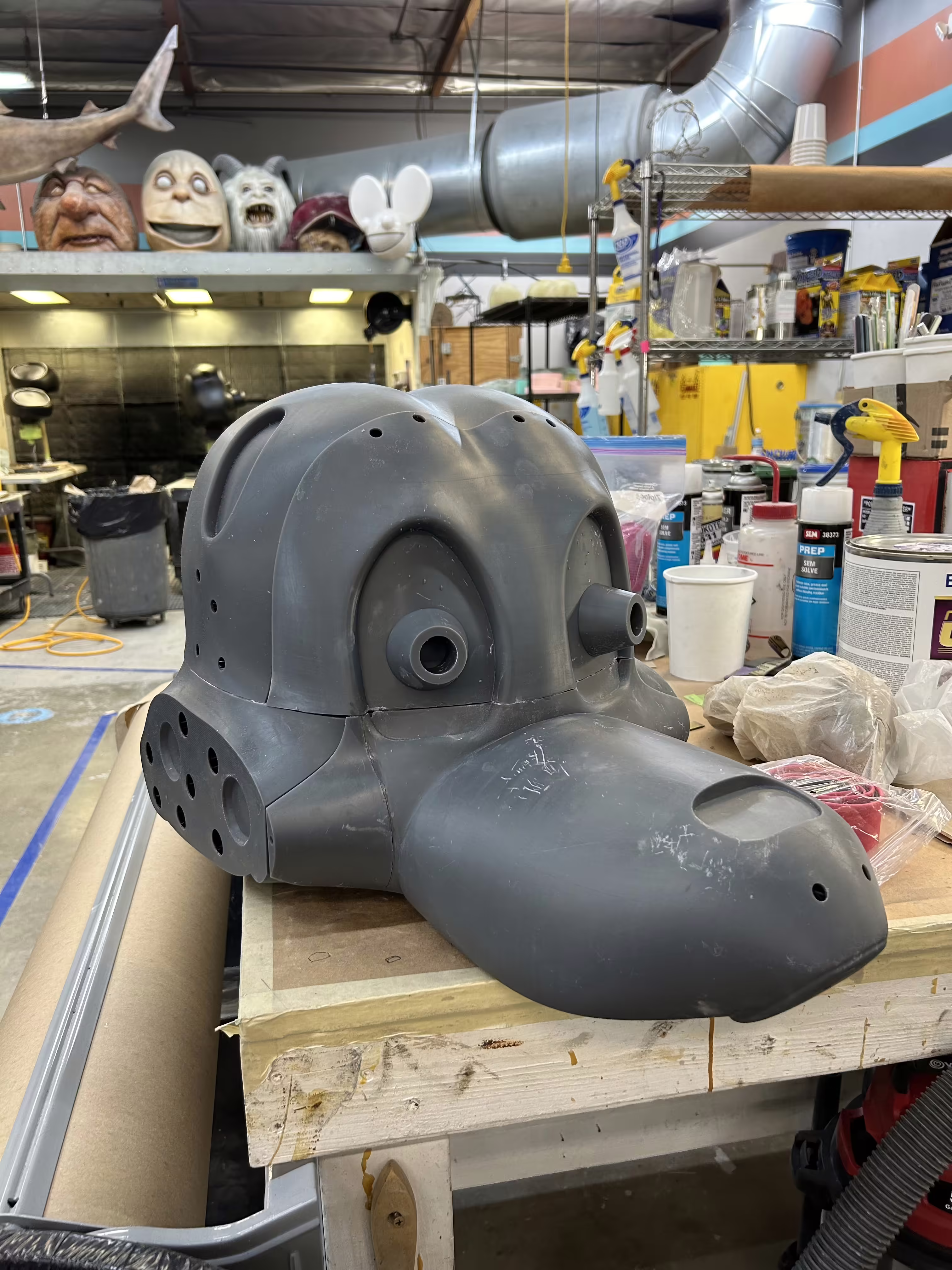 Development photo of The Mangle's head, featuring Toy Freddy's head in the background.