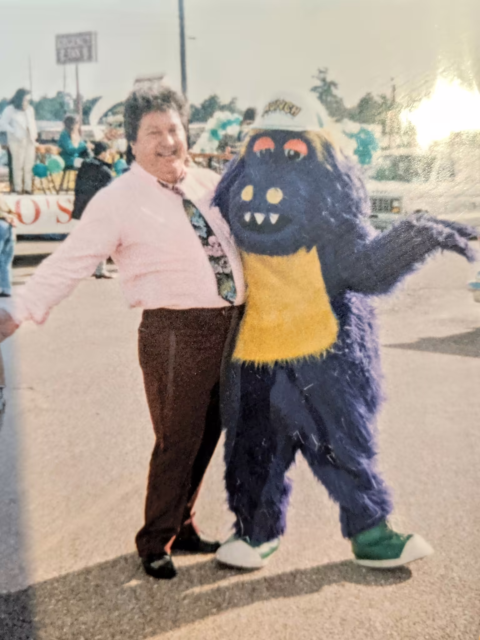 Munch walkaround posing with a worker outside of the 1960 location. (Year Unknown)