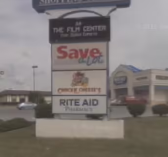 Chuck E. Cheese's 1998 sign in 2009.