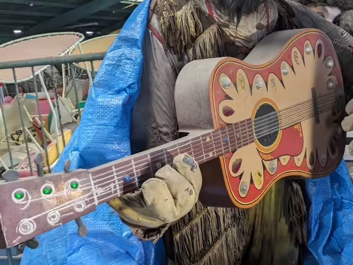 Another closeup of the guitar Sgt. Singer used, it's unknown why there are jewels on it.