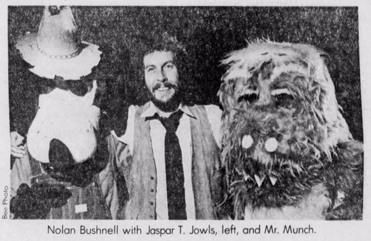 Nolan Bushnell with Jasper T. Jowls and Mr. Munch Walkarounds.
