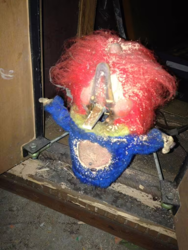 A damaged Click with the doors open.