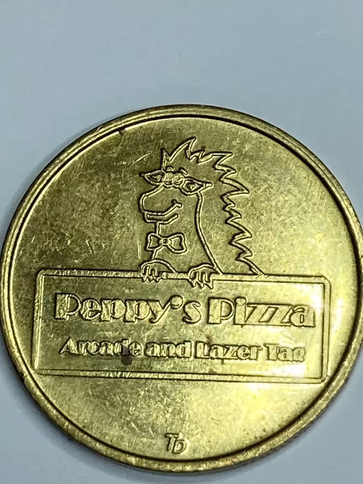 Token from Peppy's Pizza