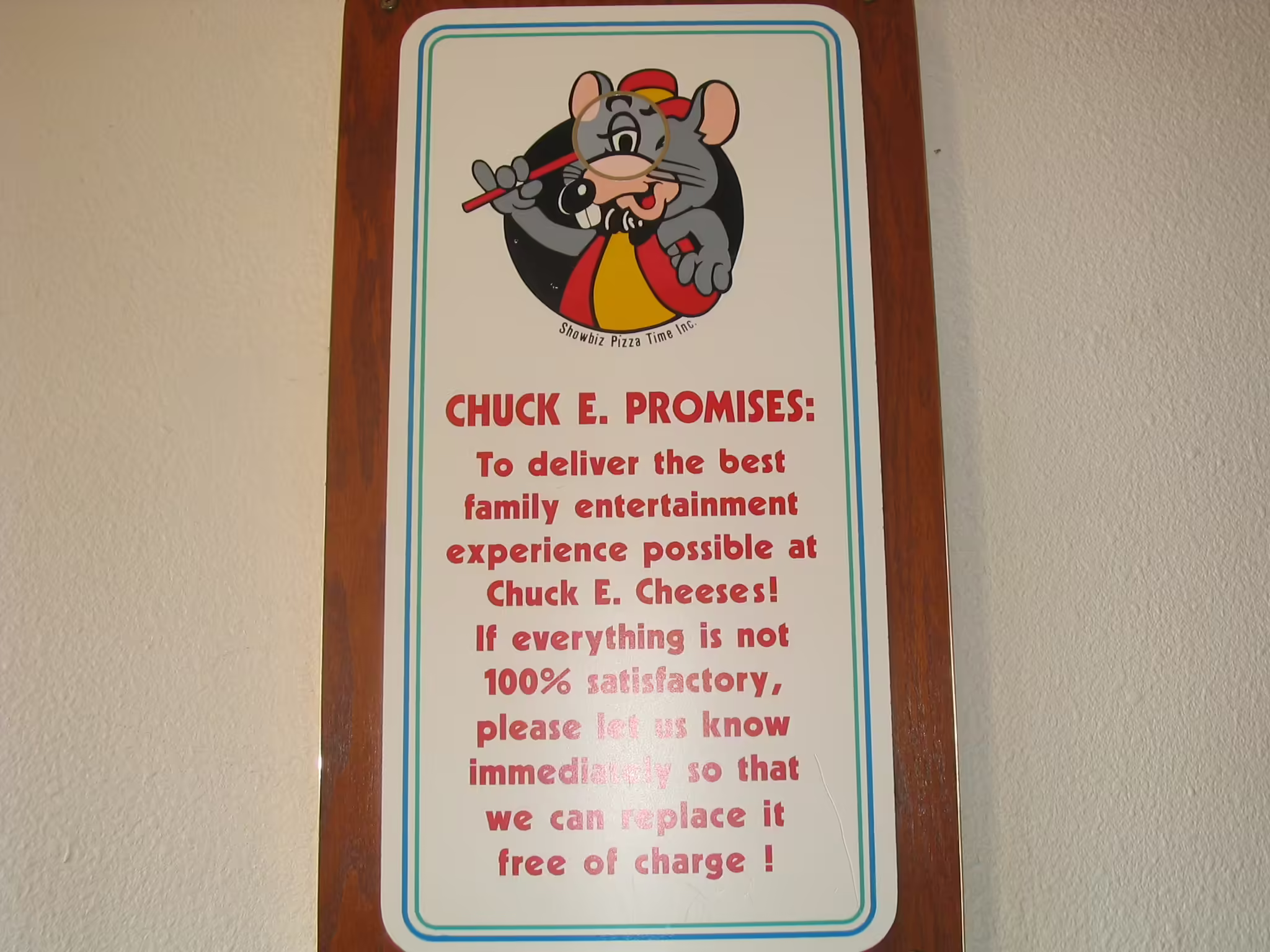 'Chuck E. Promises' Sign located in the entrance area. (Fall 2004)