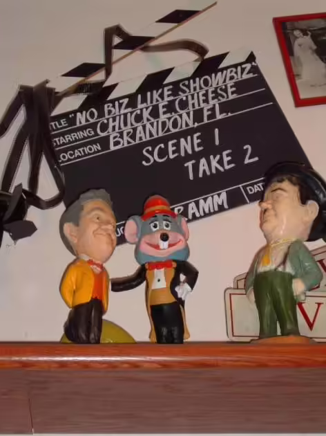 Chalkware Tux Chuck with a Laurel and Hardy Esco statue