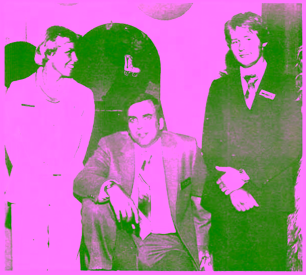 Assistant Suzanne Ammirata, Manager Mike Sullivan, and Assistant John Eliasasen in front of the Cheese Crawl.