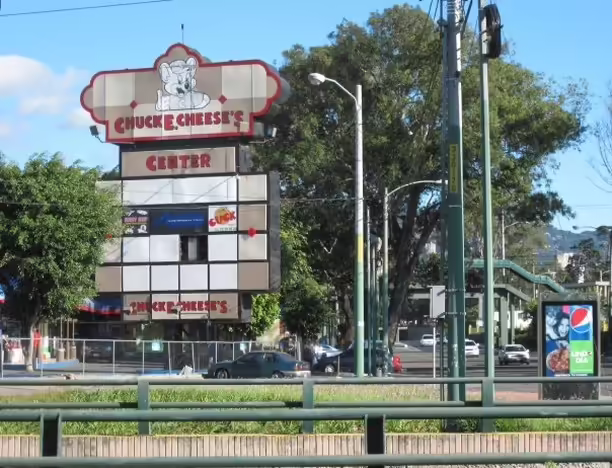 'Chuck E. Cheese Center' sign (2010)