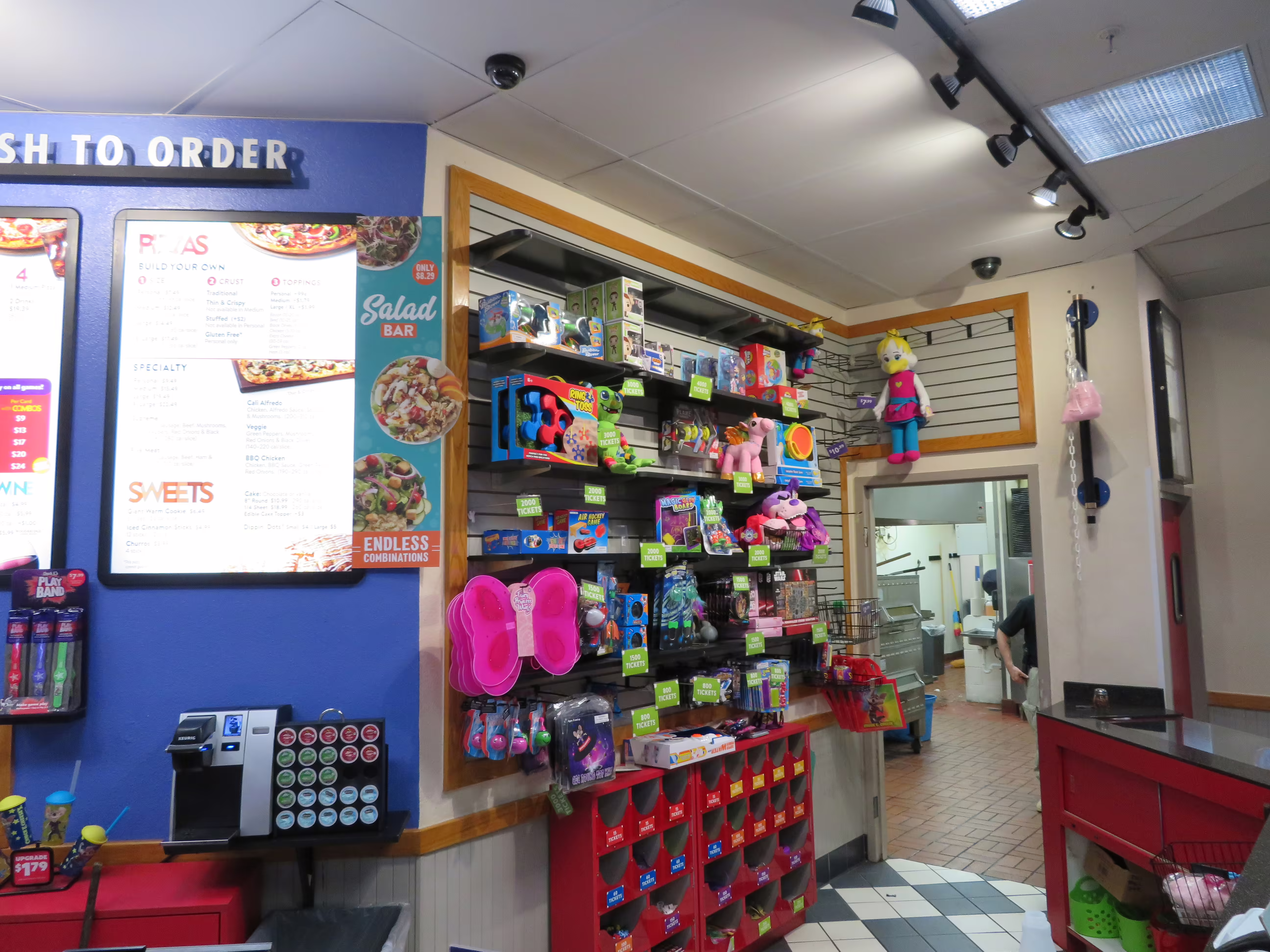 The Empty Prize Counter & a view into the Kitchen.