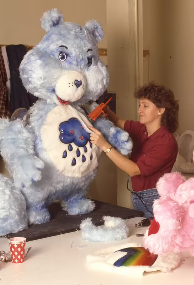 Donna Gentry costuming the Dunia Grumpy Bear figure, also at Sally (1986)